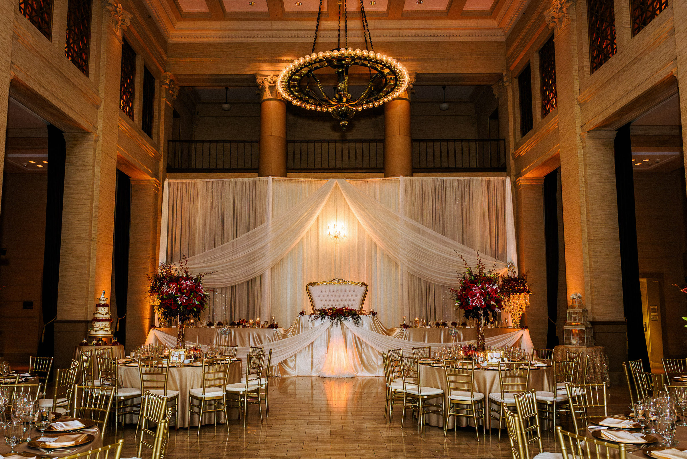 The Bently Reserve ballroom set for dinner beneath its chandelier