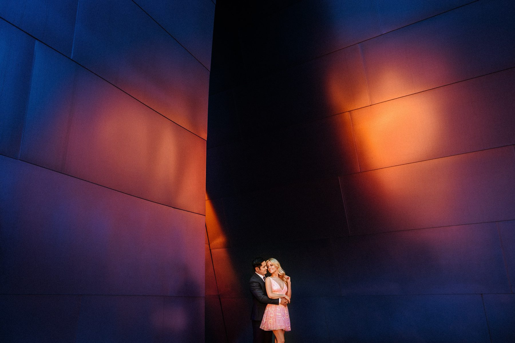 Engagement portrait outside Walt Disney Concert Hall in downtown Los Angeles