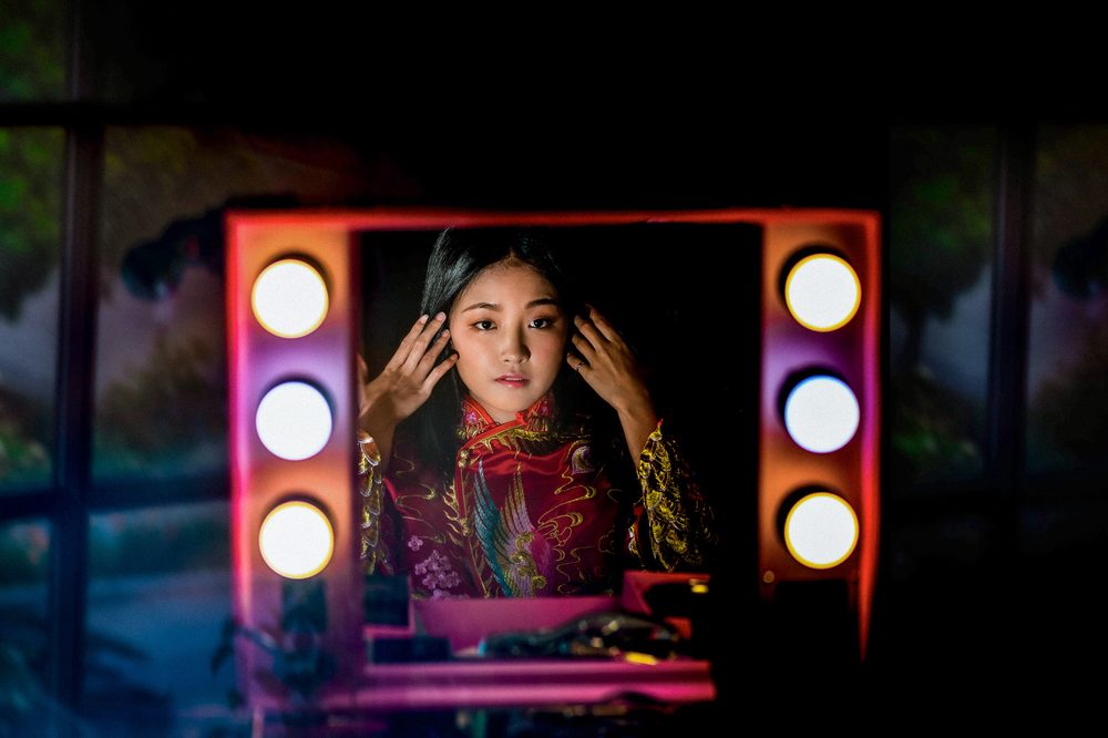Bride in traditional Chinese wedding attire during a Los Gatos wedding celebration