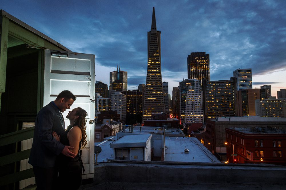San Francisco engagement photography with a couple overlooking the Transamerica Pyramid